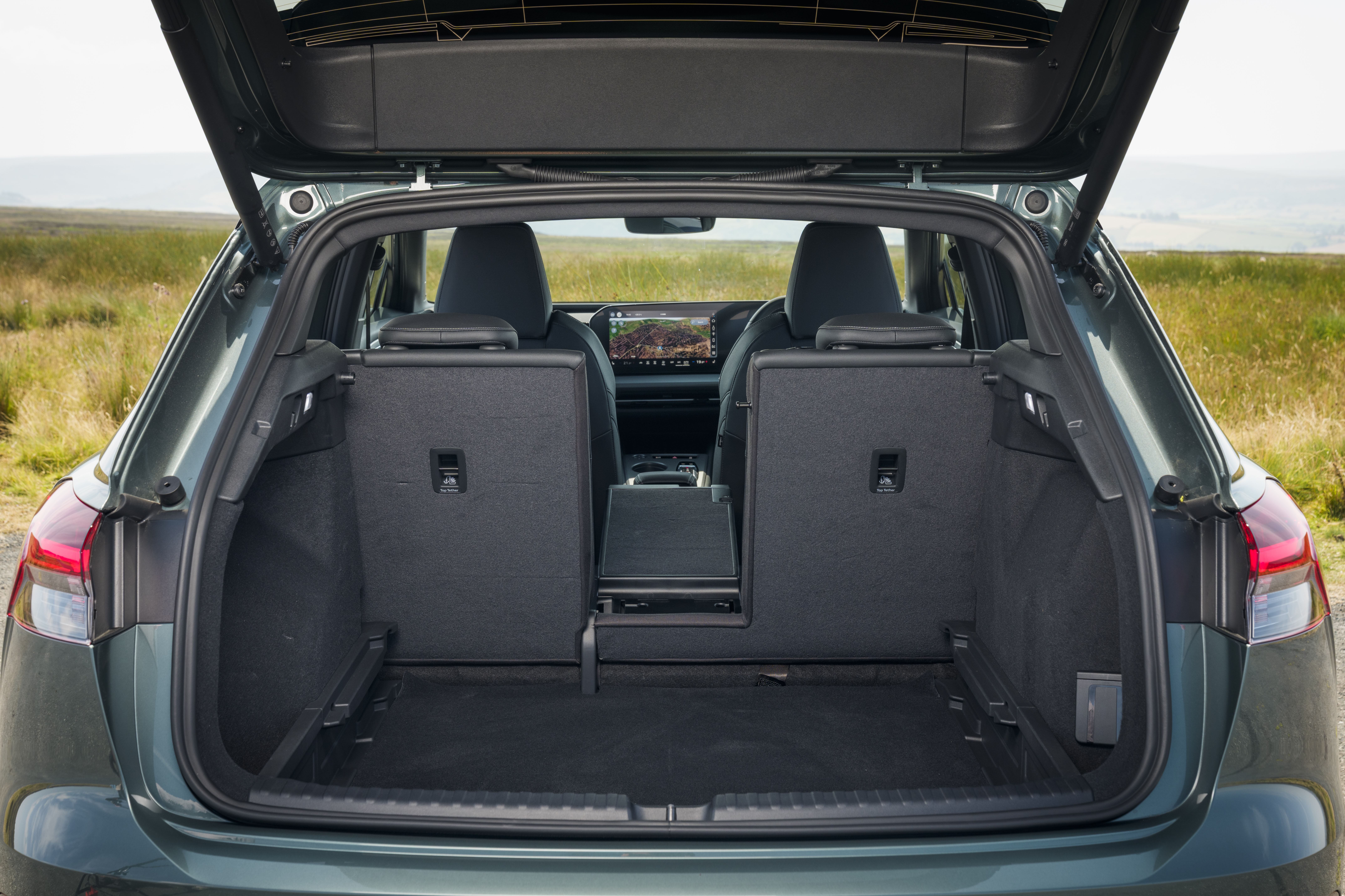  Audi Q4 e-tron boot with the rear seats upright and centre section folded down.