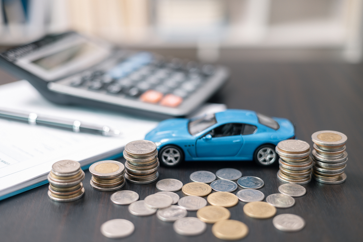 image showing money and a toy car