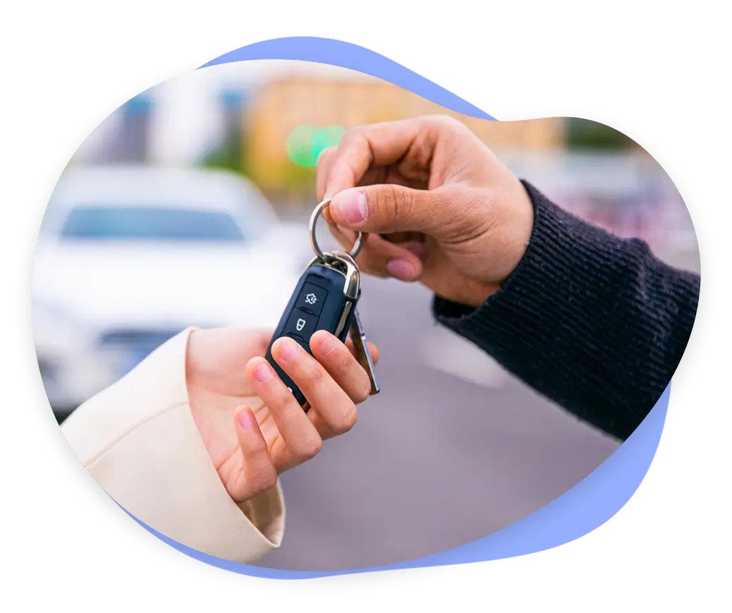 Car keys being handed over